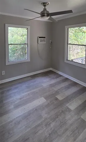 a backyard of a house with lots of green space