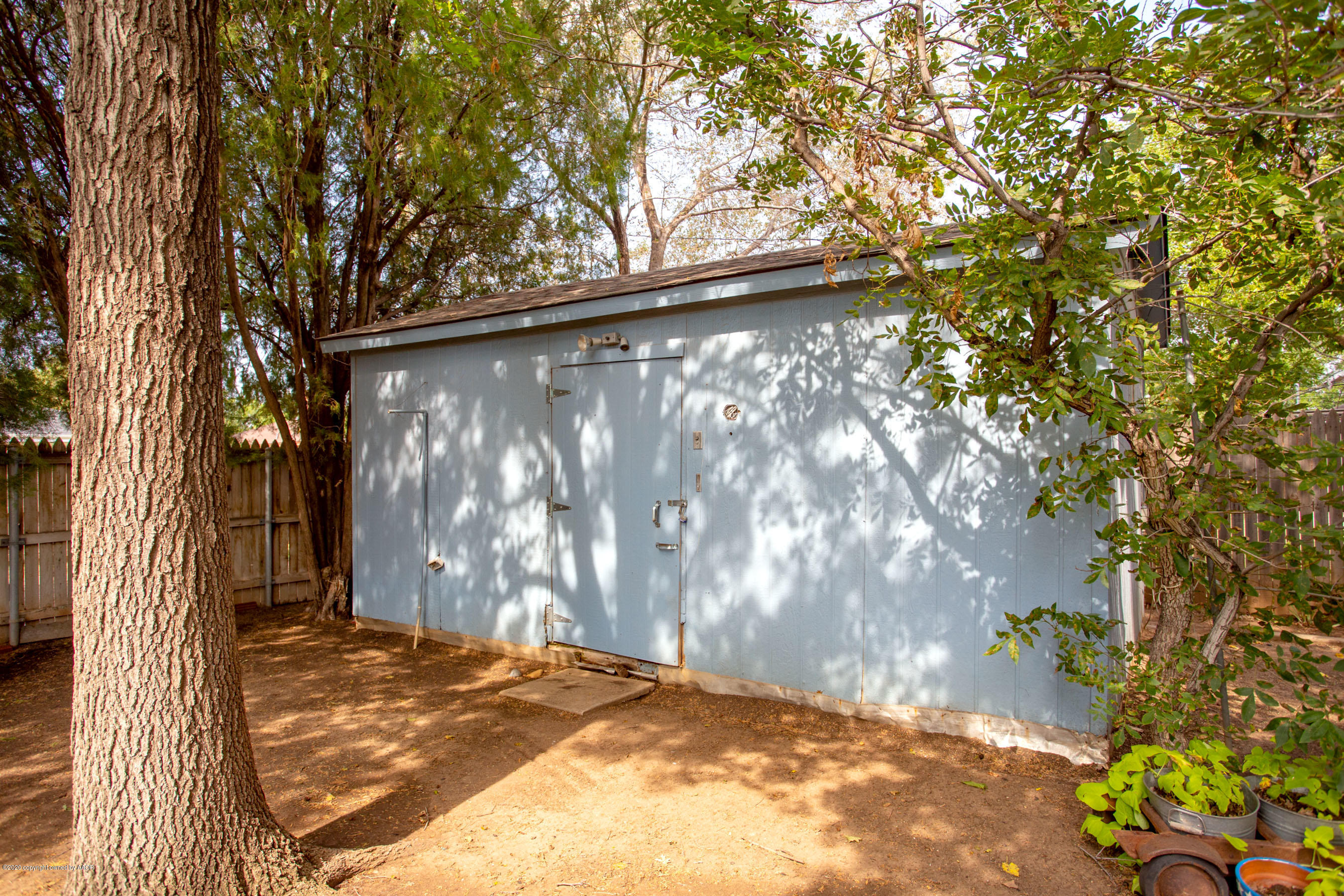 2807 Lloyd Drive Amarillo, TX 79110 - Photo 32 of 32 a view of a yard with wooden fence