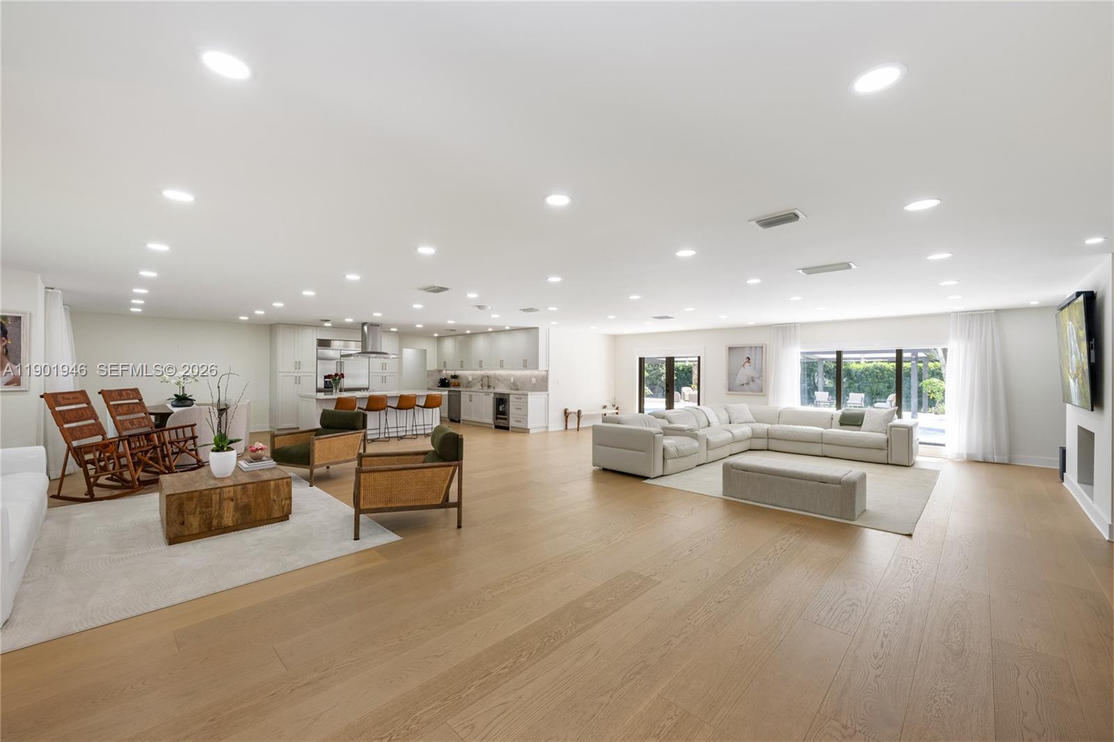 15110 North Saxon Circle Southwest Ranches, FL 33331 - Photo 2 of 45 a living room with furniture and kitchen view