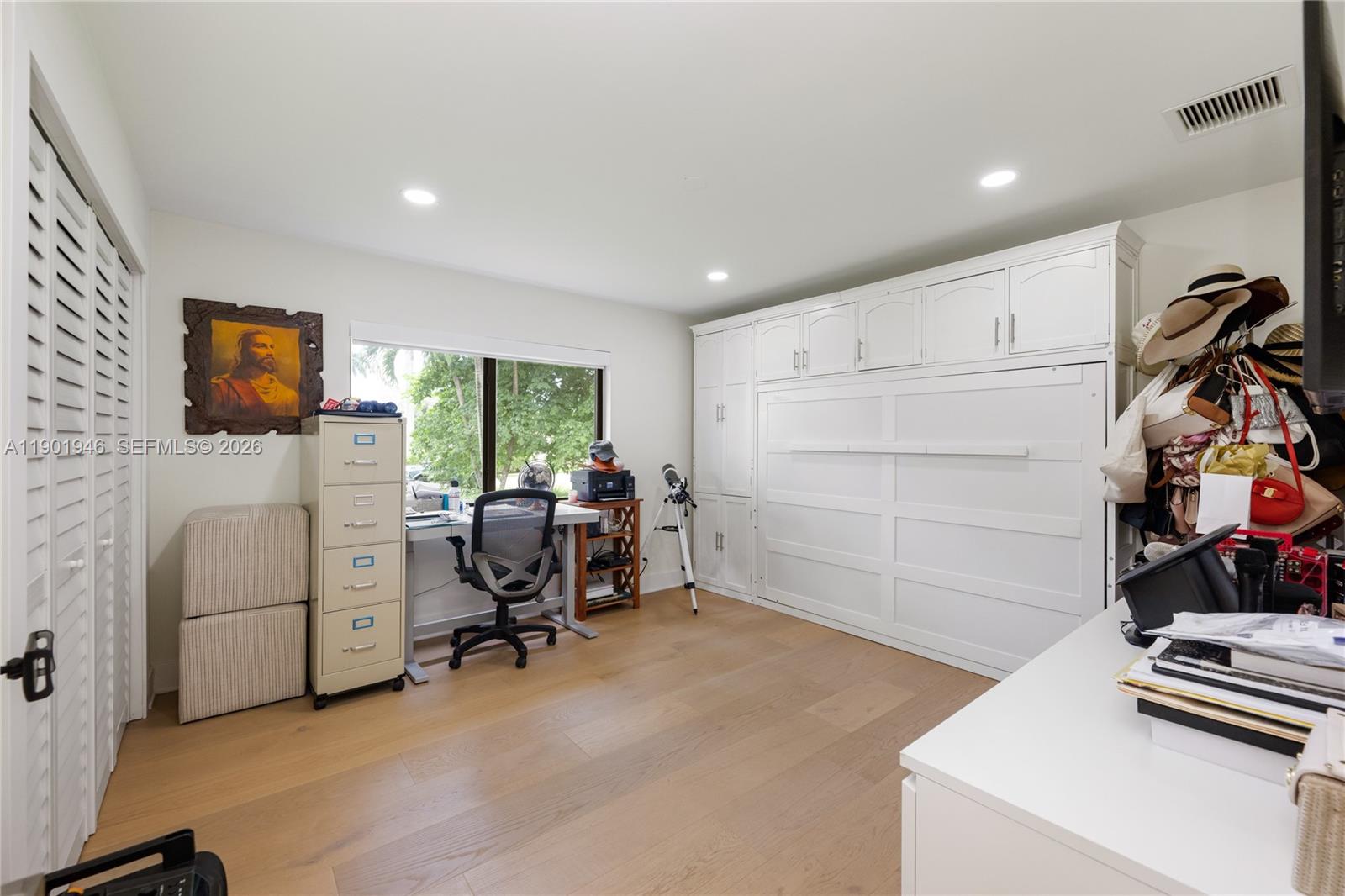 15110 North Saxon Circle Southwest Ranches, FL 33331 - Photo 22 of 45 a view of a workspace with furniture