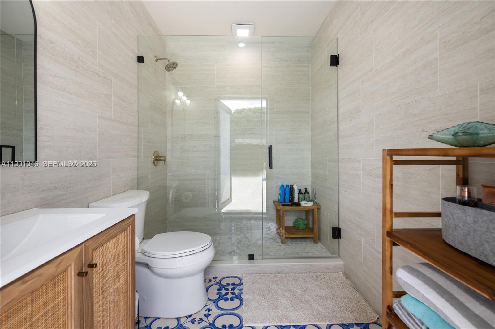 15110 North Saxon Circle Southwest Ranches, FL 33331 - Photo 32 of 45 a bathroom with a sink a toilet and shower