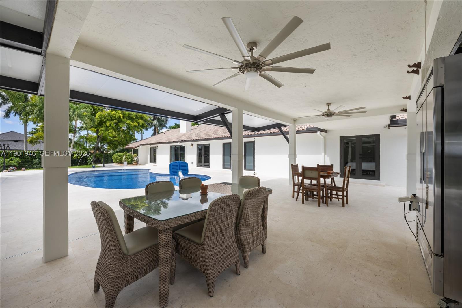 15110 North Saxon Circle Southwest Ranches, FL 33331 - Photo 37 of 45 a view of a dining room with furniture window and outside view