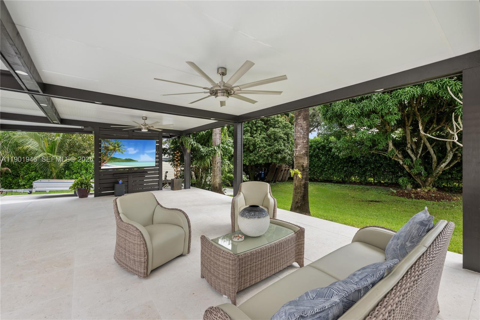 15110 North Saxon Circle Southwest Ranches, FL 33331 - Photo 38 of 45 a living room with patio fireplace furniture and garden
