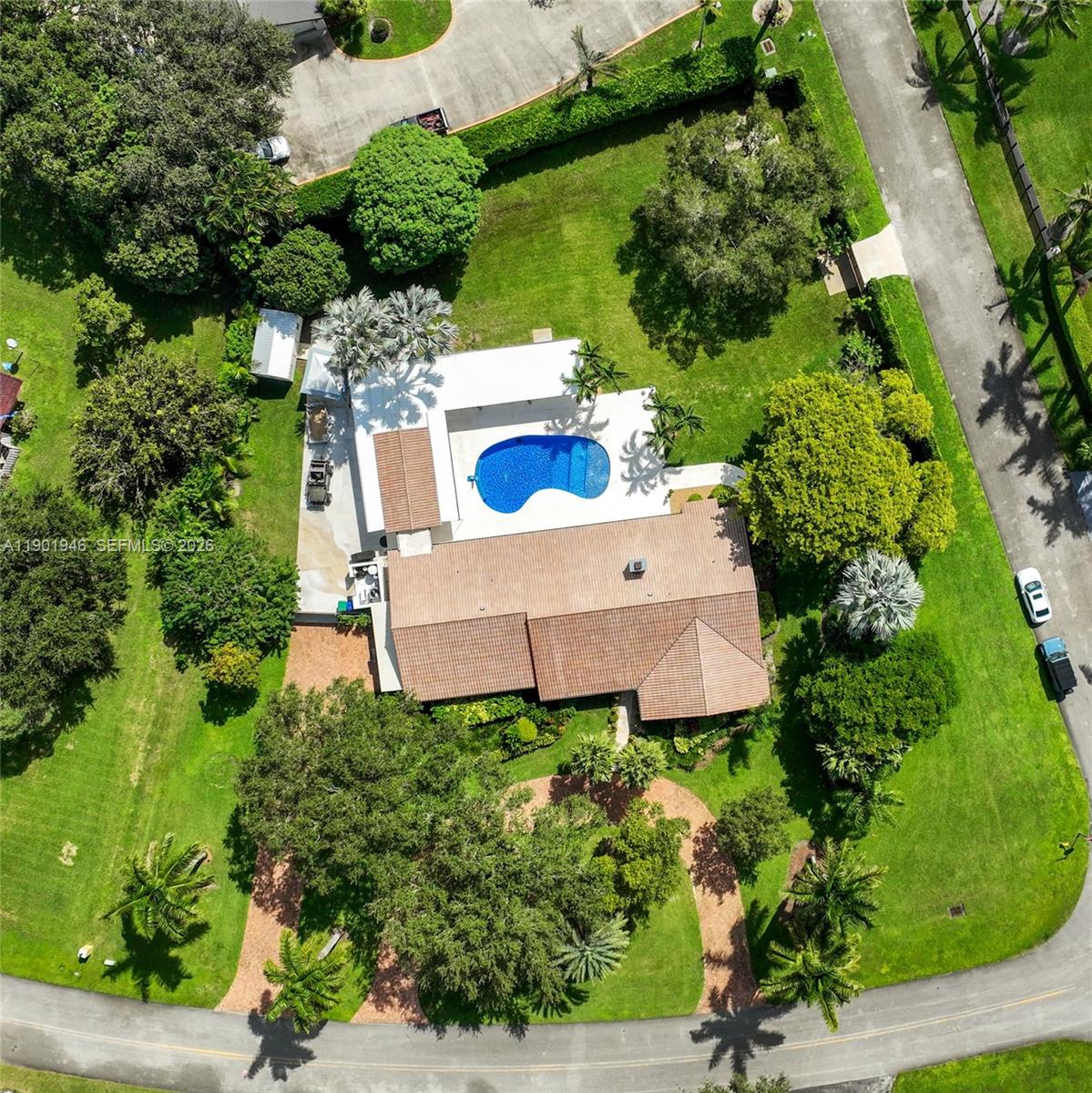 15110 North Saxon Circle Southwest Ranches, FL 33331 - Photo 42 of 45 an aerial view of a house with yard and outdoor seating