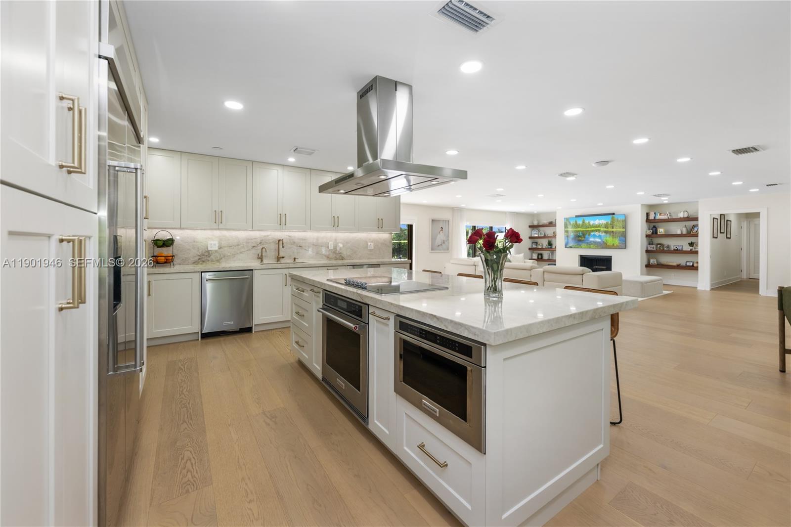 15110 North Saxon Circle Southwest Ranches, FL 33331 - Photo 8 of 45 a kitchen with a stove and a sink