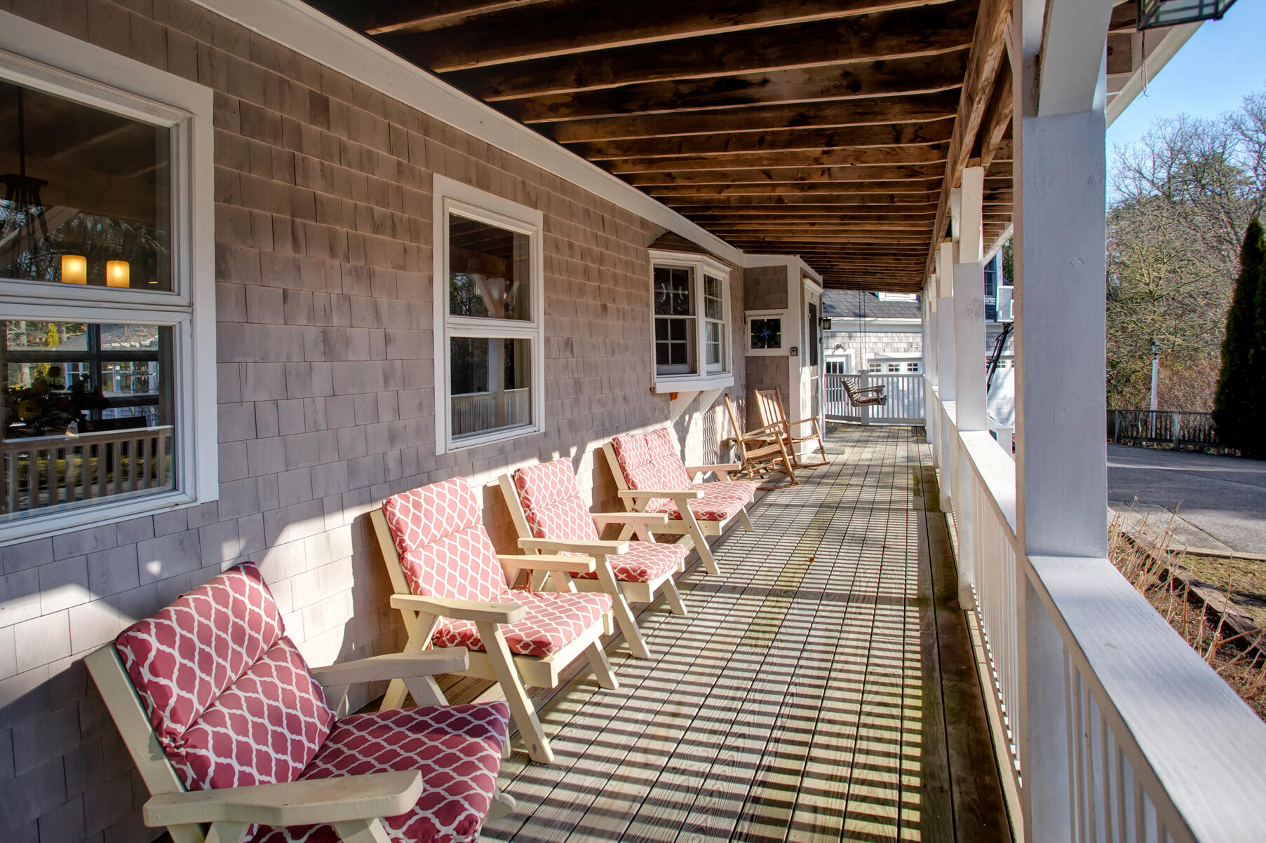 a view of a patio with chairs and tables