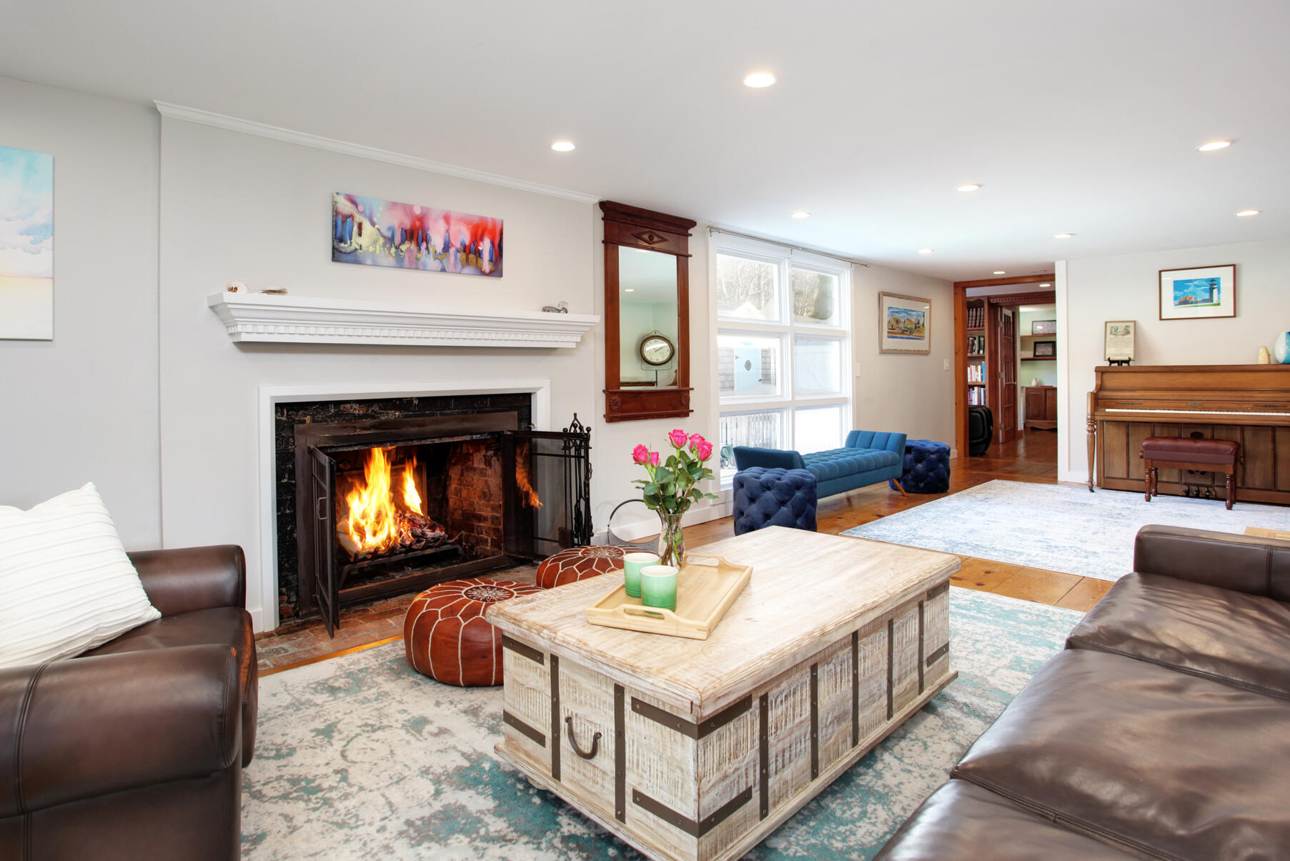 21 5 Corners Road Centerville, MA 02632 - Photo 11 of 38 a living room with furniture and a fireplace