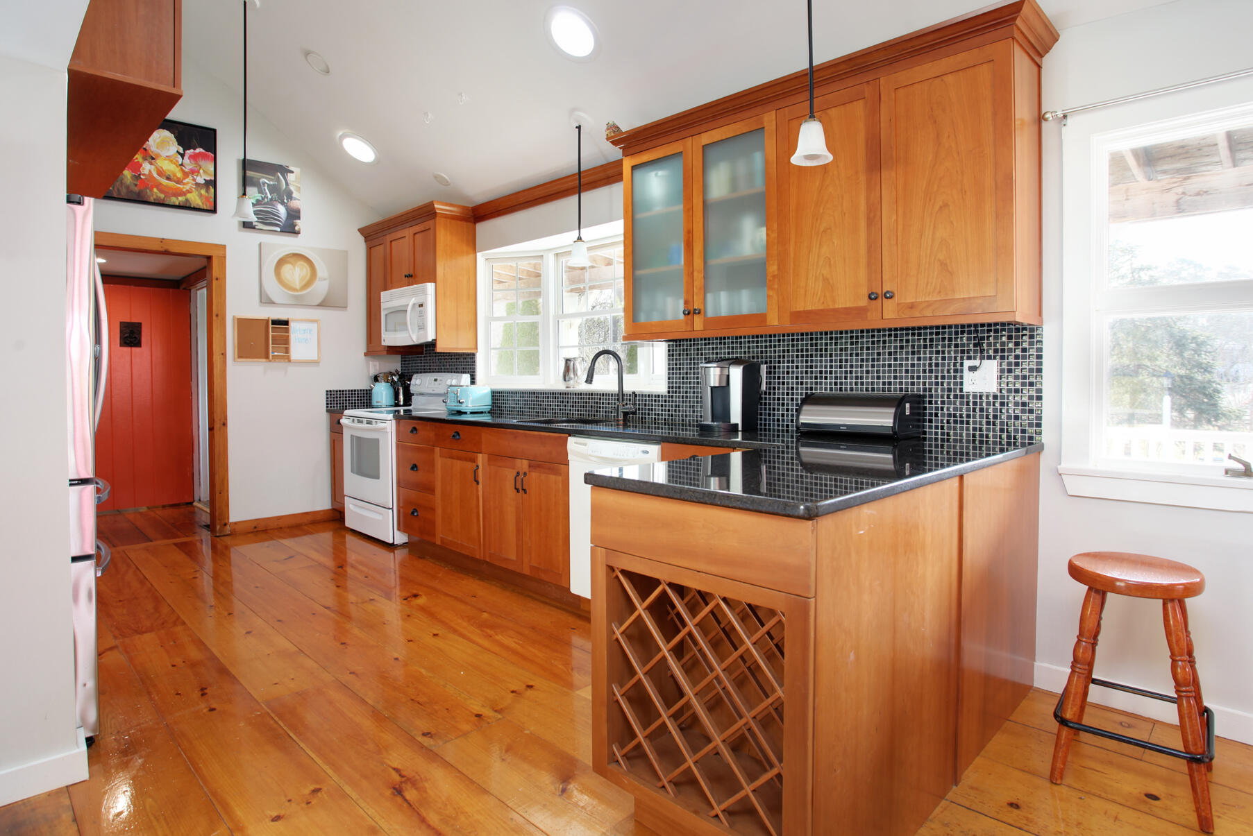 21 5 Corners Road Centerville, MA 02632 - Photo 14 of 38 a kitchen with stainless steel appliances granite countertop a stove a sink and a refrigerator