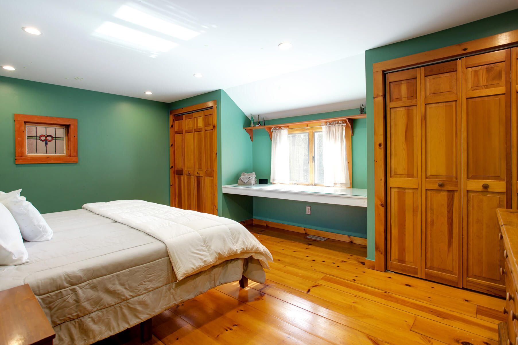 21 5 Corners Road Centerville, MA 02632 - Photo 24 of 38 a bedroom with a bed and a dresser