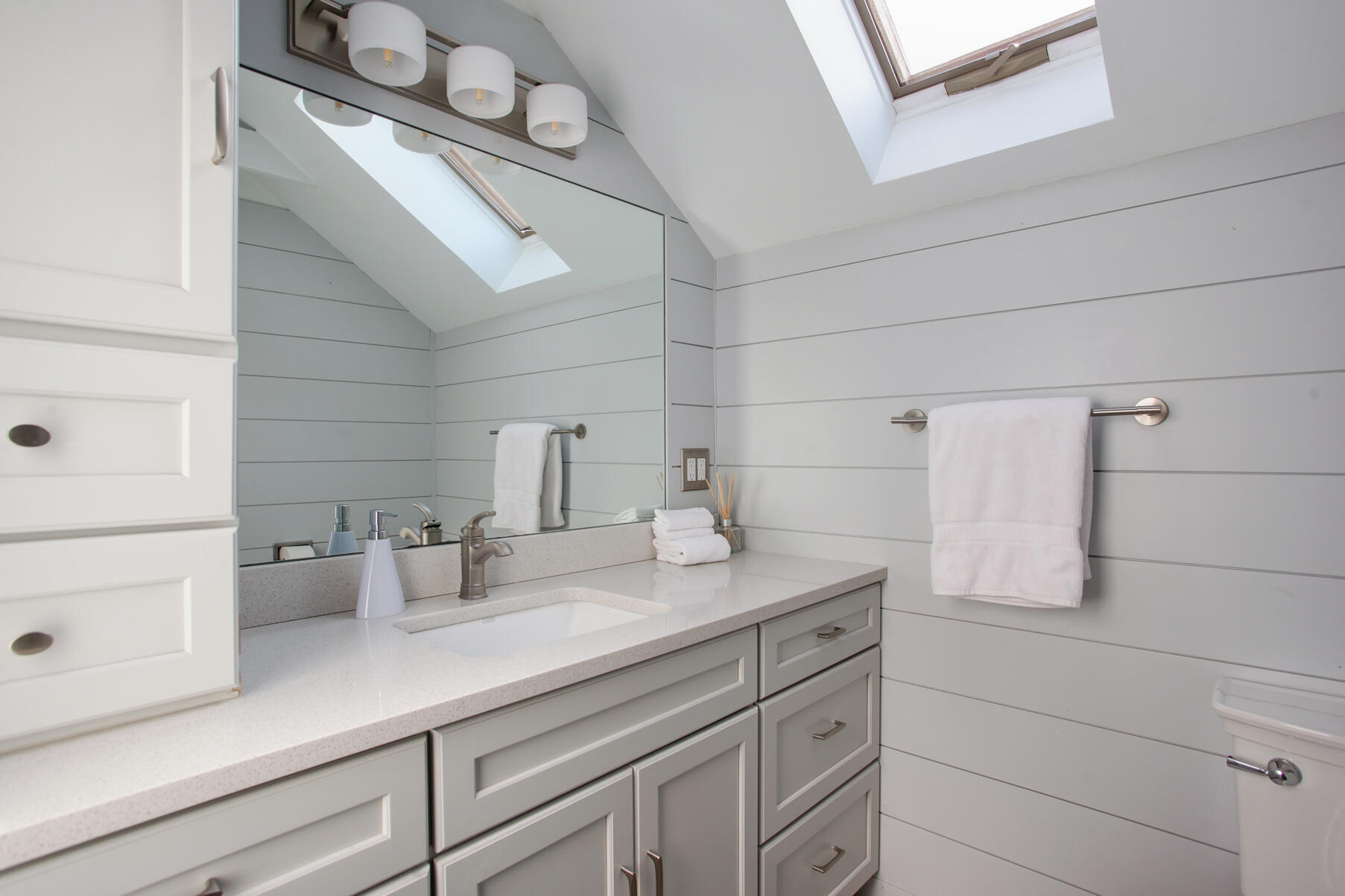 21 5 Corners Road Centerville, MA 02632 - Photo 25 of 38 a kitchen with a sink and cabinets