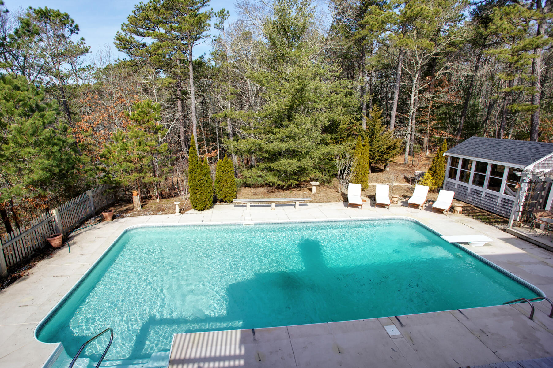 21 5 Corners Road Centerville, MA 02632 - Photo 30 of 38 a view of yard with swimming pool and seating space