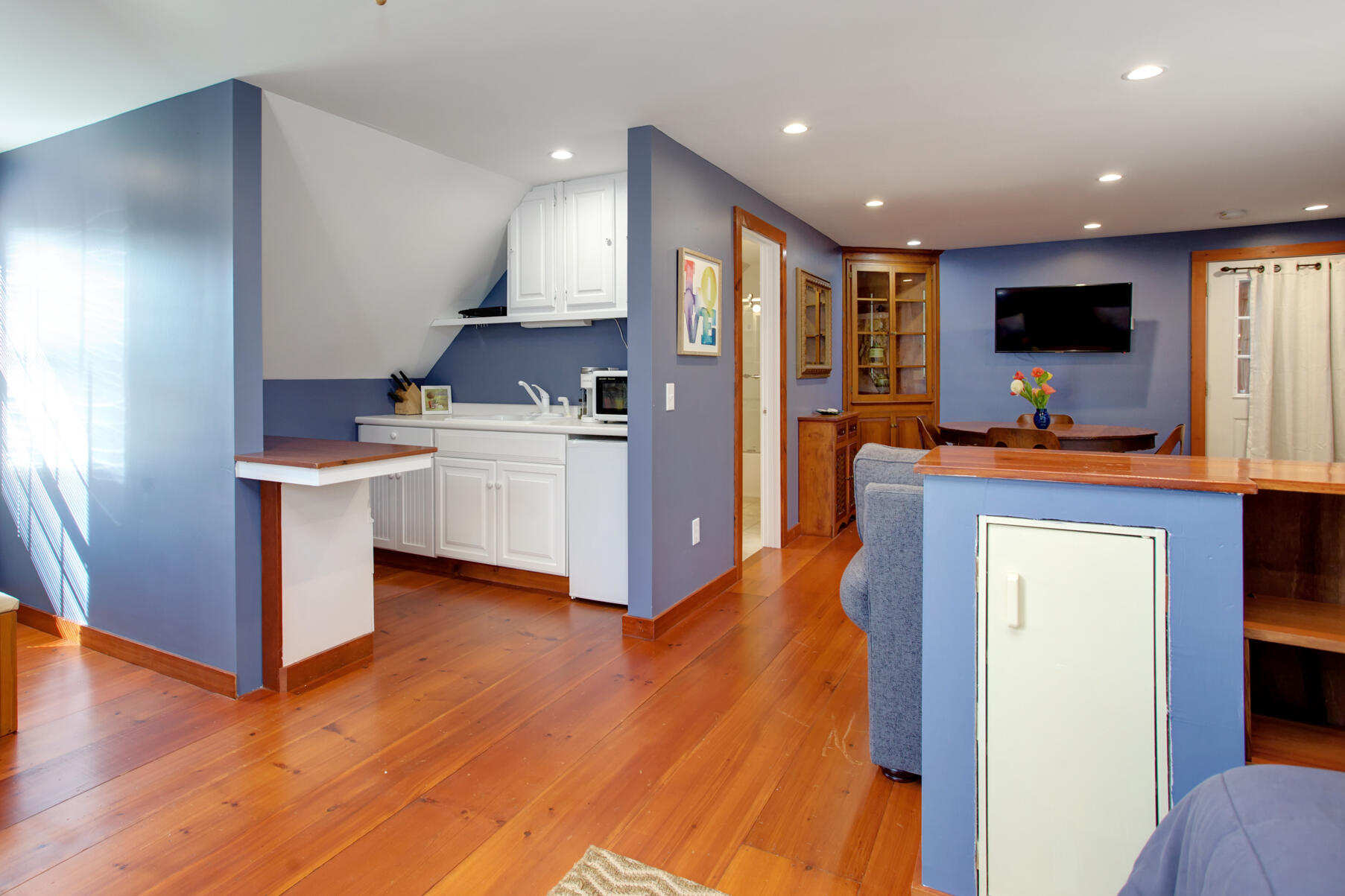 21 5 Corners Road Centerville, MA 02632 - Photo 34 of 38 a open kitchen with stainless steel appliances granite countertop a sink stove and refrigerator