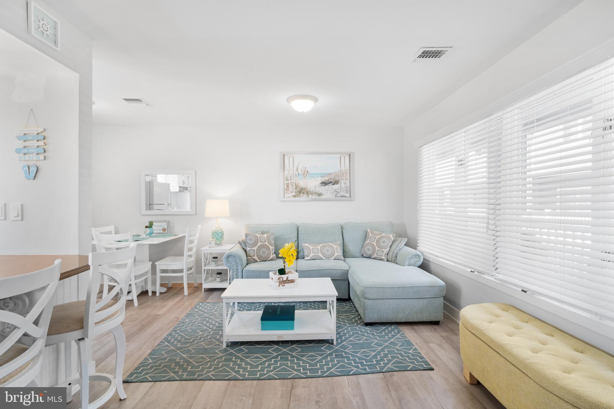 1709 Highway 35, Unit 9 Seaside Heights, NJ 08751 - Photo 3 of 28 a living room with furniture and a couch