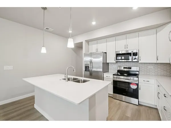 $485,161 | 410 High Point Drive, Unit 104, Longmont, CO 80504
