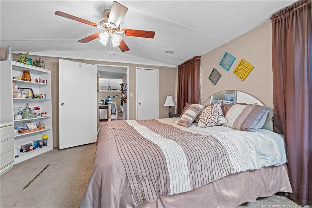 5236-5240 Maxwell Road Stedman, NC 28391 - Photo 17 of 50 a bedroom with a bed and dresser