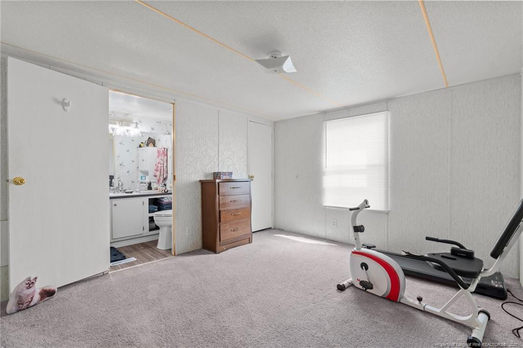 5236-5240 Maxwell Road Stedman, NC 28391 - Photo 2 of 50 a view of a room with fridge and a window