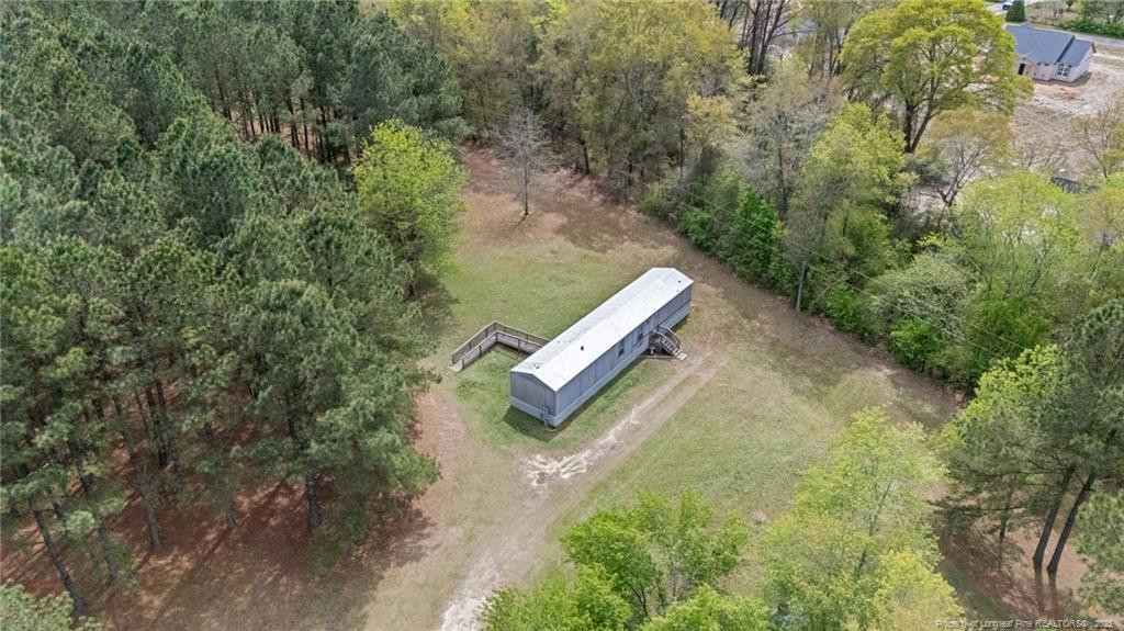 5236-5240 Maxwell Road Stedman, NC 28391 - Photo 46 of 50 a view of a yard with plants