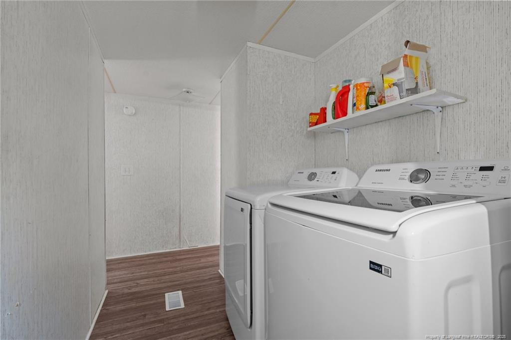 5236-5240 Maxwell Road Stedman, NC 28391 - Photo 6 of 50 a utility room with dryer and washer