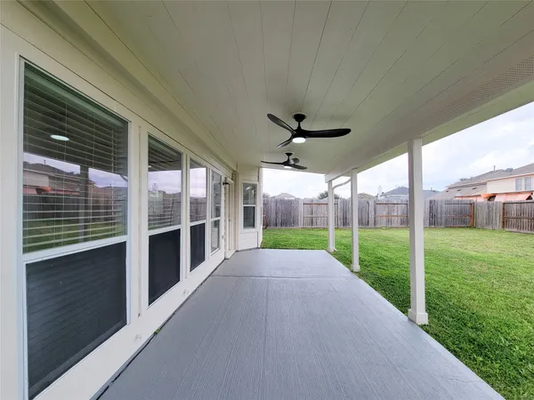 a view of a porch and garden