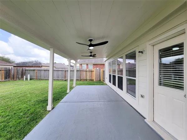 a view of a porch with a backyard