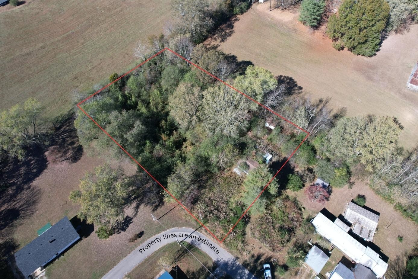 an aerial view of residential house with outdoor space