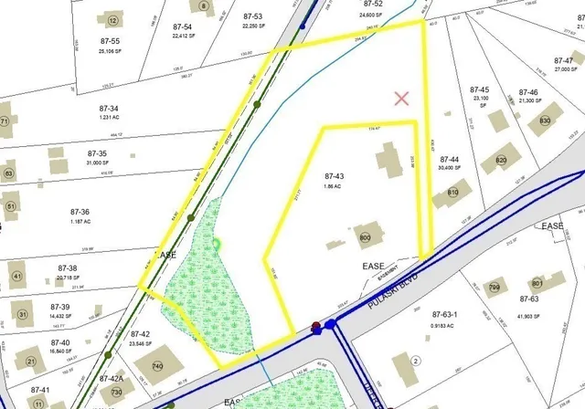 a view of balcony with wooden floor