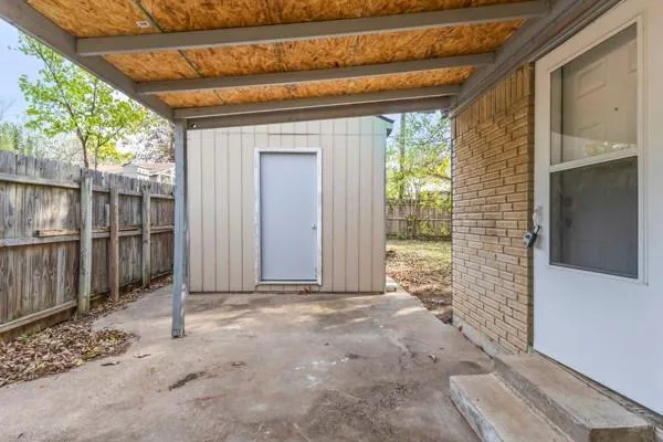 a view of backyard with green space