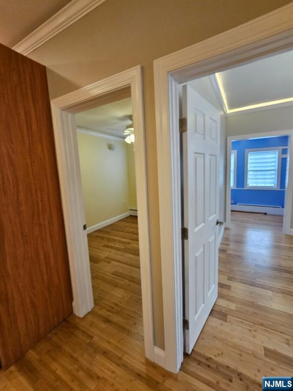 29 Willard Street, Unit 2 Garfield, NJ 07026 - Photo 11 of 21 a view of a hallway with wooden floor and staircase