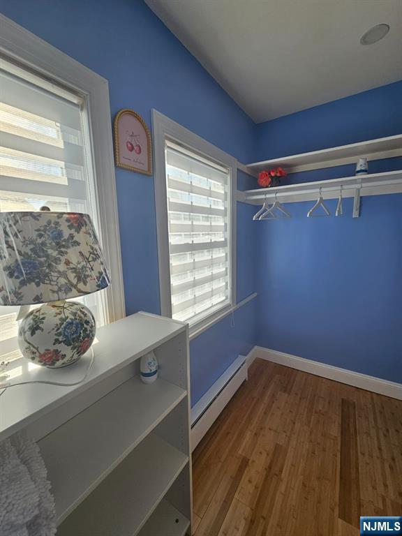 29 Willard Street, Unit 2 Garfield, NJ 07026 - Photo 14 of 21 a room with a window and a wooden floor