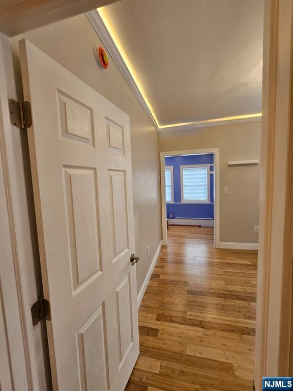 29 Willard Street, Unit 2 Garfield, NJ 07026 - Photo 17 of 21 a view of a hallway with wooden floor and staircase