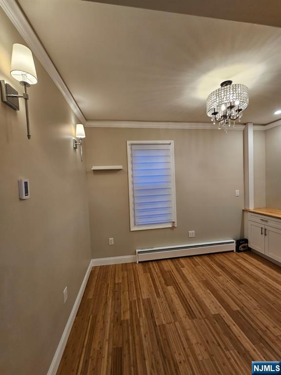 29 Willard Street, Unit 2 Garfield, NJ 07026 - Photo 8 of 21 wooden floor in an empty room with a window