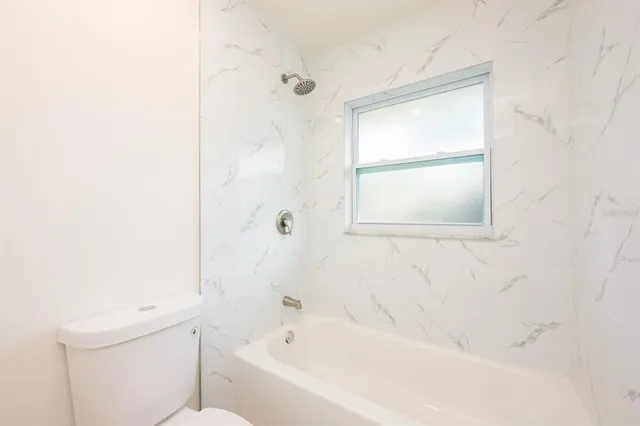 a bathroom with a bathtub