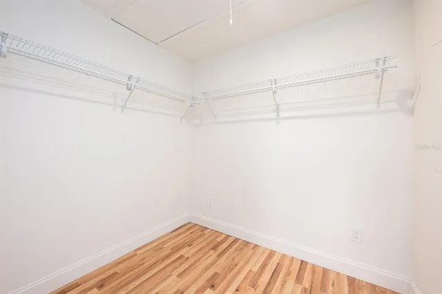 a view of a room with racks on the wall