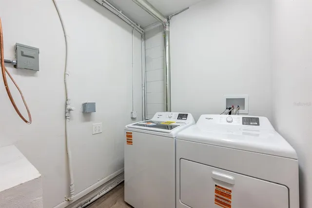 a utility room with dryer and washer