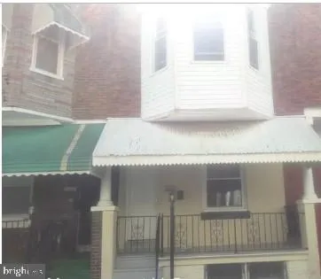 a kitchen with a stove and a microwave