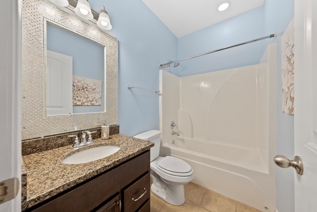 67 Pin Oak Way Hamilton, GA 31811 - Photo 18 of 65 a bathroom with a granite countertop sink toilet and shower