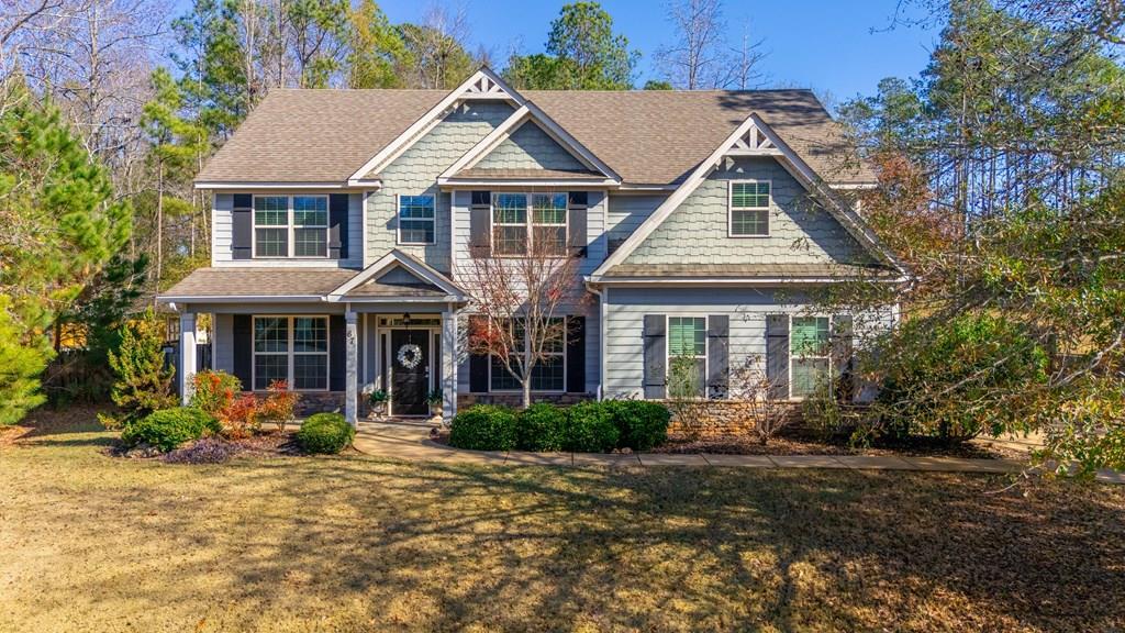 67 Pin Oak Way Hamilton, GA 31811 - Photo 2 of 65 a front view of a house with a porch