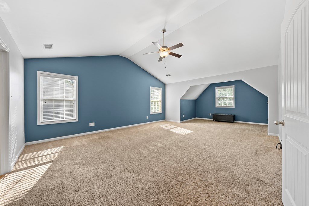 67 Pin Oak Way Hamilton, GA 31811 - Photo 27 of 65 a view of empty room with windows and ceiling fan