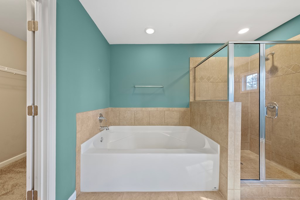 67 Pin Oak Way Hamilton, GA 31811 - Photo 32 of 65 a bathroom with a bathtub and a shower