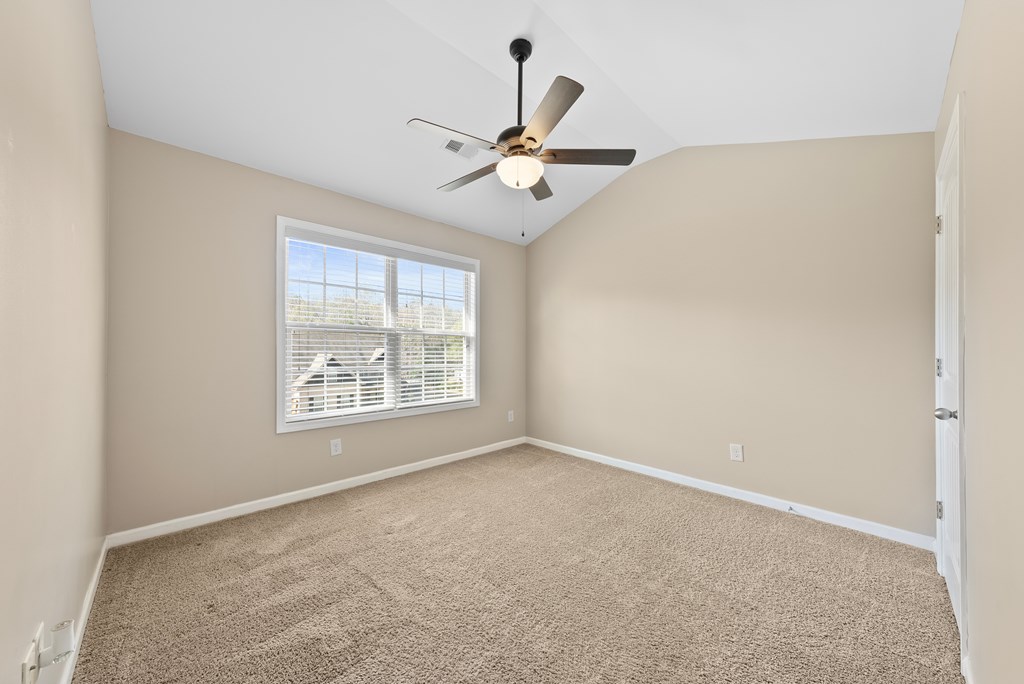 67 Pin Oak Way Hamilton, GA 31811 - Photo 34 of 65 a view of an empty room with a window