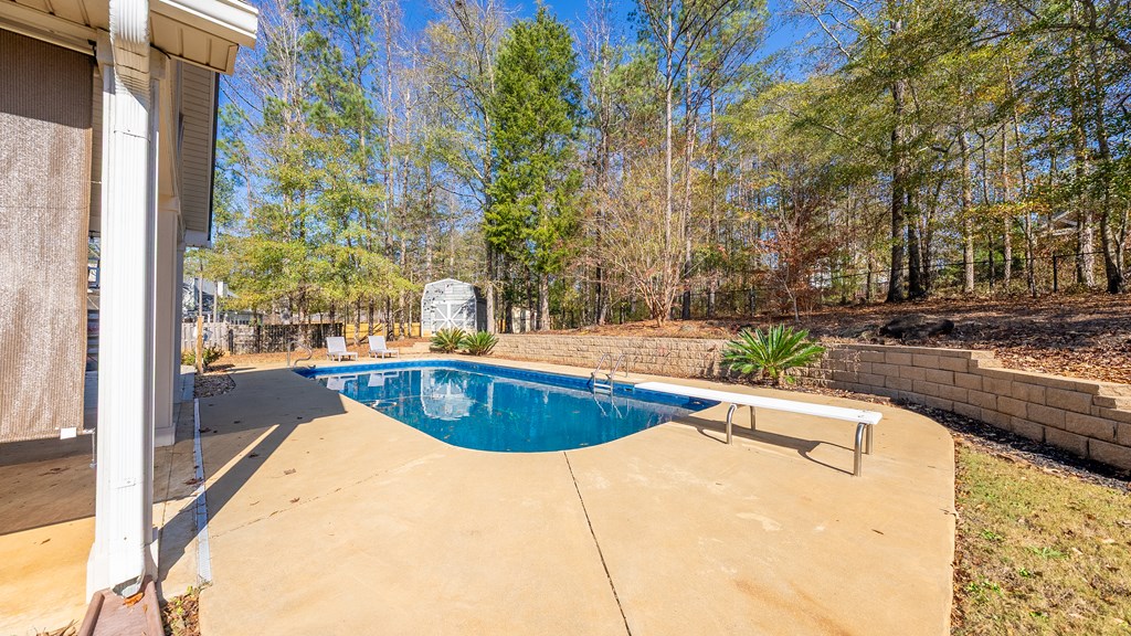 67 Pin Oak Way Hamilton, GA 31811 - Photo 46 of 65 a view of a swimming pool with a yard