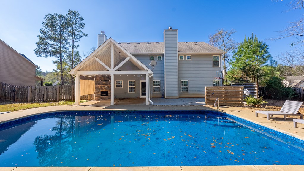 67 Pin Oak Way Hamilton, GA 31811 - Photo 49 of 65 a view of a house with pool and a yard