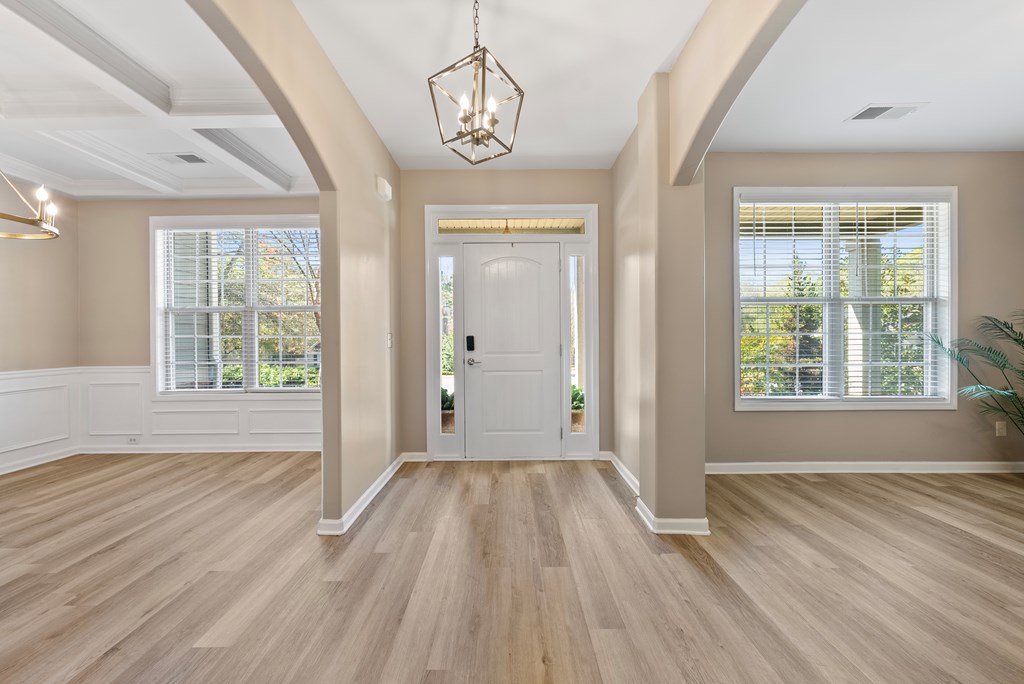 67 Pin Oak Way Hamilton, GA 31811 - Photo 5 of 65 wooden floor in an empty room with a window