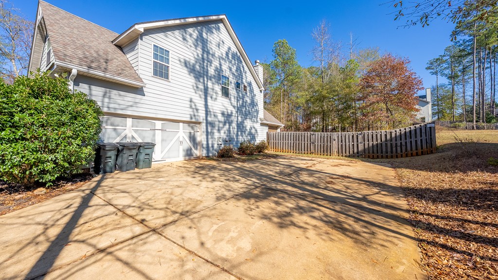 67 Pin Oak Way Hamilton, GA 31811 - Photo 56 of 65 a view of backyard with large trees and wooden fence