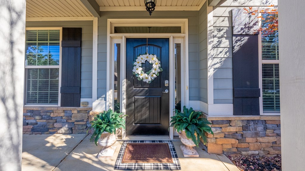 67 Pin Oak Way Hamilton, GA 31811 - Photo 57 of 65 a front view of a house with a yard