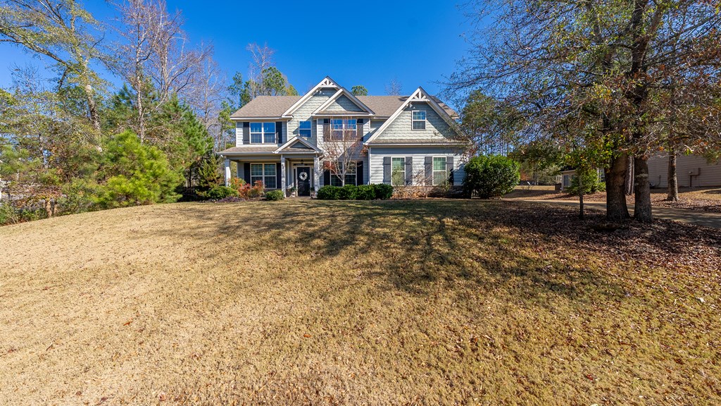 67 Pin Oak Way Hamilton, GA 31811 - Photo 62 of 65 a front view of a house with a garden