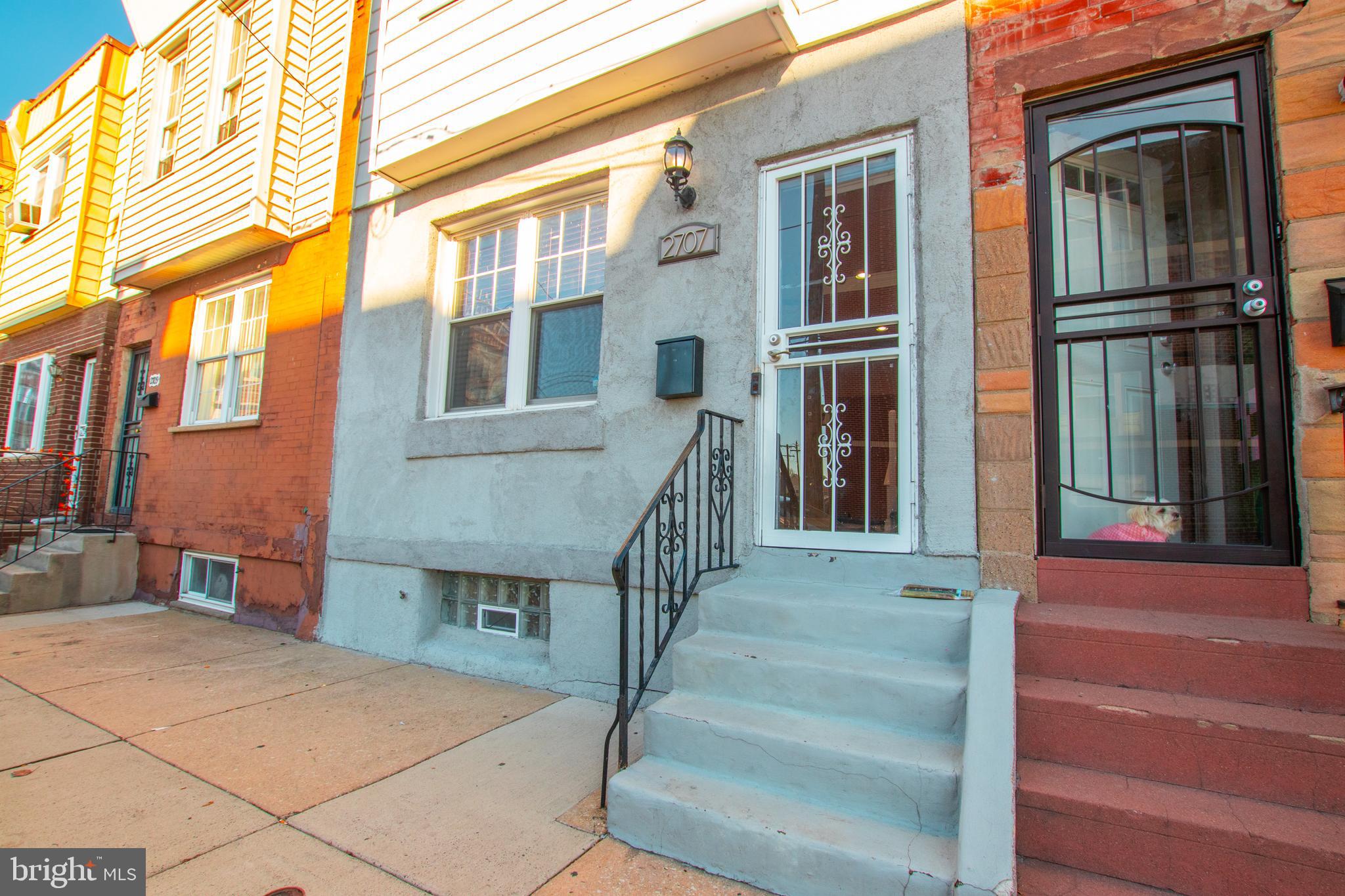 2707 Morris Street Philadelphia, PA 19145 - Photo 1 of 26 a view of a brick building with many windows