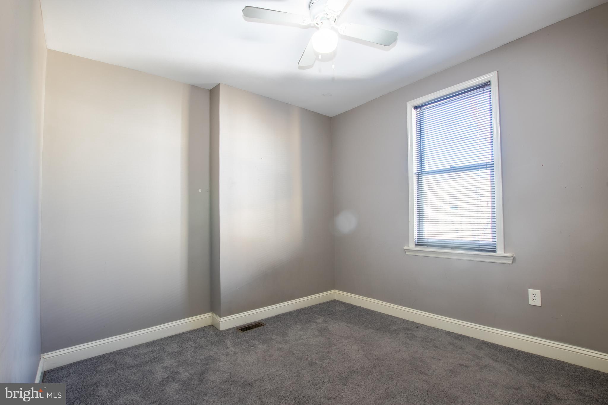 2707 Morris Street Philadelphia, PA 19145 - Photo 16 of 26 an empty room with a window