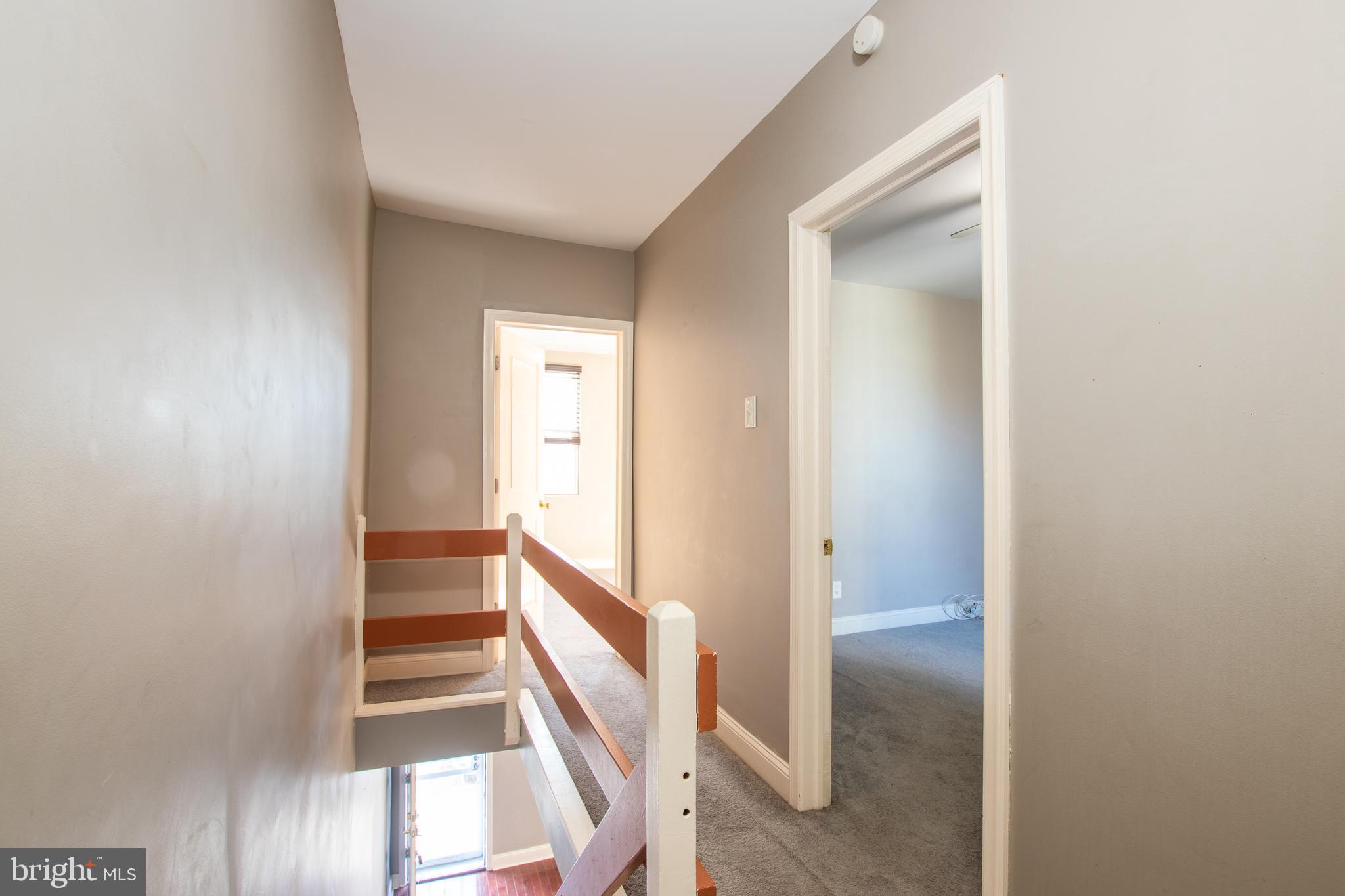 2707 Morris Street Philadelphia, PA 19145 - Photo 17 of 26 a view of a hallway with wooden floor and entryway
