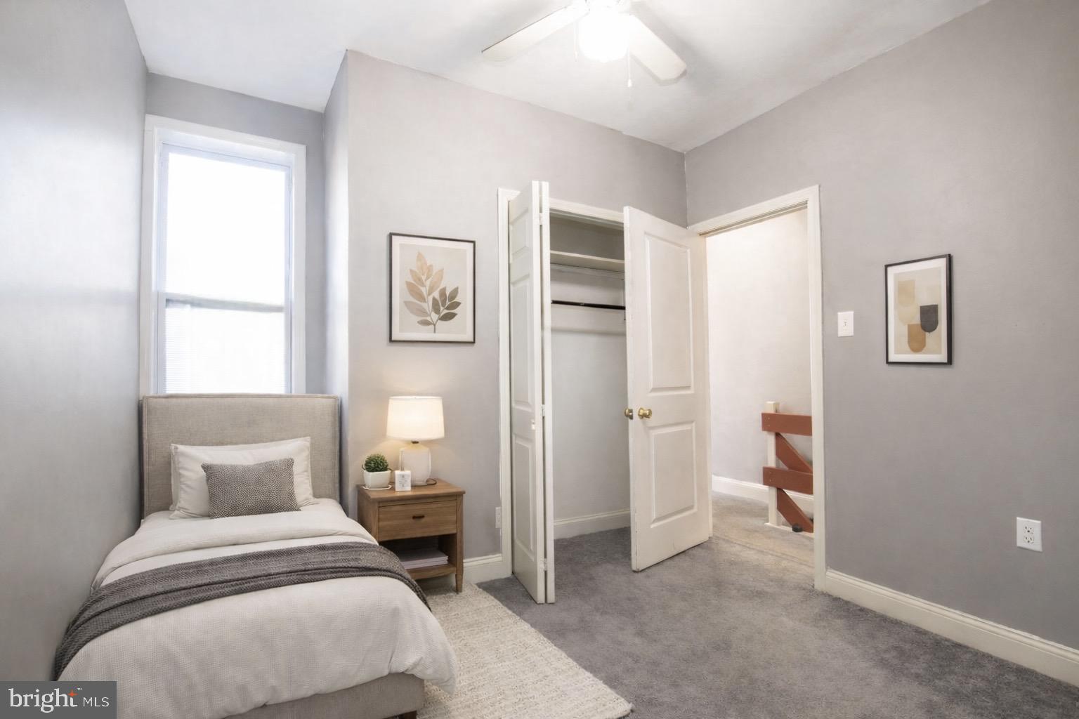 2707 Morris Street Philadelphia, PA 19145 - Photo 18 of 26 a spacious bedroom with a bed and a window